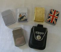 4 Zippo lighters and one other (Hadson)