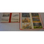 2 red albums of topographical postcards