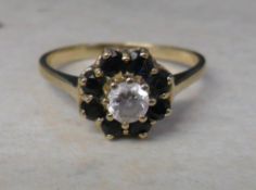 Tested as 18ct gold dress ring with sapp