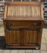 Modern bureau with linen fold panel