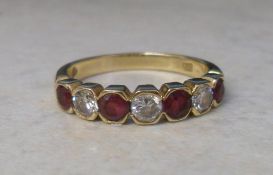 18ct gold diamond and ruby eternity ring