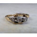 18ct gold ring with 3 diamonds in heart