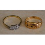 2 18ct gold rings with stones missing