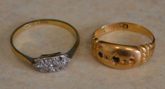 2 18ct gold rings with stones missing