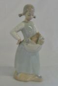 Nao figurine of a girl with kittens