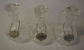 Glass decanters & jug with silver plated