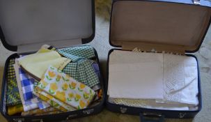 2 suitcases of linen and fabrics