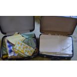 2 suitcases of linen and fabrics
