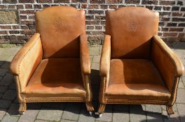 Pair of leather arm chairs