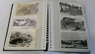 Postcard album containing topographical