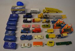 Various diecast model cars including Cor