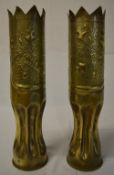 Pair of trench art shells, one featuring