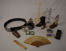 Various boots, silk fan, zebra skin belt