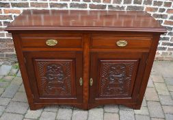 Late Victorian sideboard with carved pan