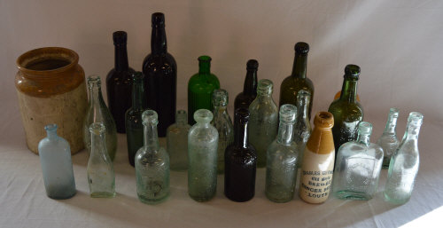 Various bottles including Charles Cuthbe