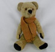 Vintage teddy bear with knitted scarf 35