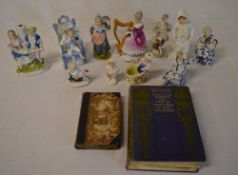 Continental ceramic figures and two book