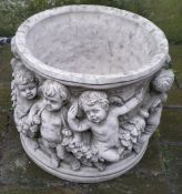 Concrete planter depicting cherubs