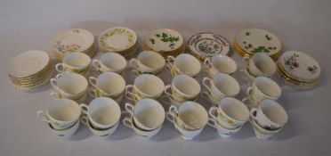 Various ceramic cups, saucers and small