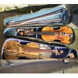 2 cased violins with 3 bows one with fak