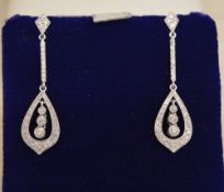 18ct white gold diamond drop earrings, a
