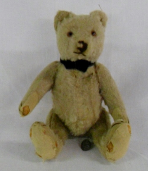 Reproduction early Steiff teddy bear wit