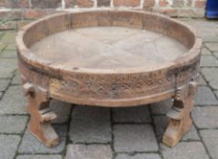Round wooden bowl on legs