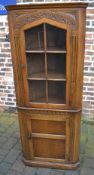 Reproduction oak corner cabinet