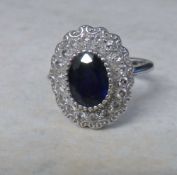 14ct white gold diamond and sapphire rin