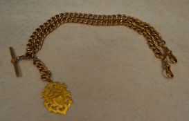 9ct gold watch chain with T bar and meda