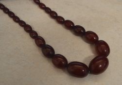 Cherry amber graduated bead necklace wit