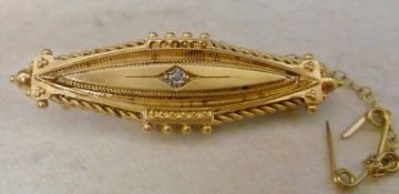 Victorian bar brooch set with single sma