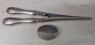 Pair of silver handled glove stretchers