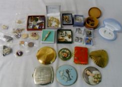 Various compacts, badges, cufflinks and