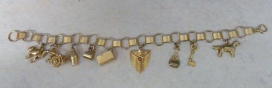 9ct gold charm bracelet weight 20.8 g