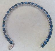 London sterling silver blue topaz tennis