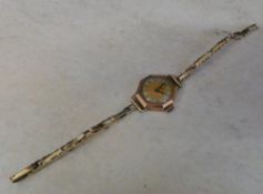 9ct gold ladies watch and strap length 7