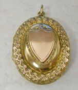 Victorian oval locket with embossed shie