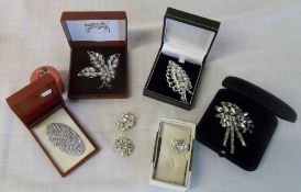 Selection of diamante costume brooches,