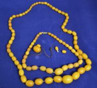 2 strings of egg yolk amber beads total