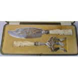 Cased set of ivory handled fish servers