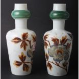 A pair of 19th Century continental floral decorated glass vases