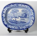 A 19th Century blue and white oval dish with landscape decoration