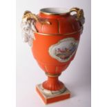 A Dresden porcelain vase with orange and gilt decorated body painted floral reserves and gilt ram'