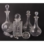 Four cut glass decanters, various