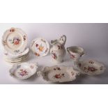 A mid 19th Century bone china floral decorated dessert service comprising eight plates, four dishes,