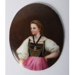 A 19th Century continental porcelain oval portrait panel, woman in regional costume, 3 1/8" x 2 1/