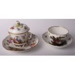 A 19th Century Meissen porcelain cabinet cup and saucer with figure decoration and a similar