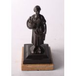 A 19th Century bronze figure of a girl with a basket of flowers, on marble base, 6" high