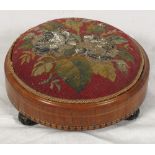 A needlepoint circular top footstool with beads (for restoration)
